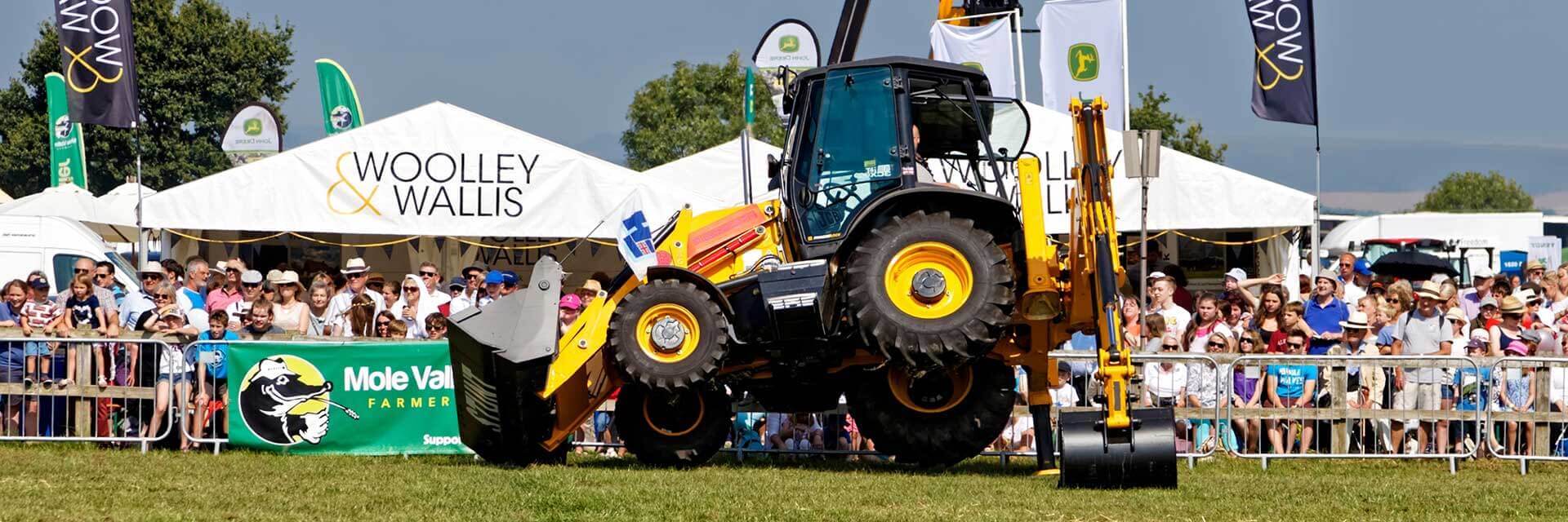 Digger tilted at an event.